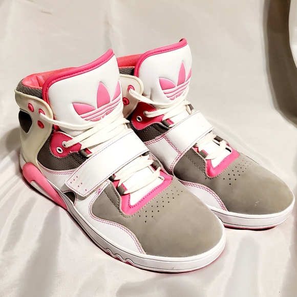 pink and white high top adidas